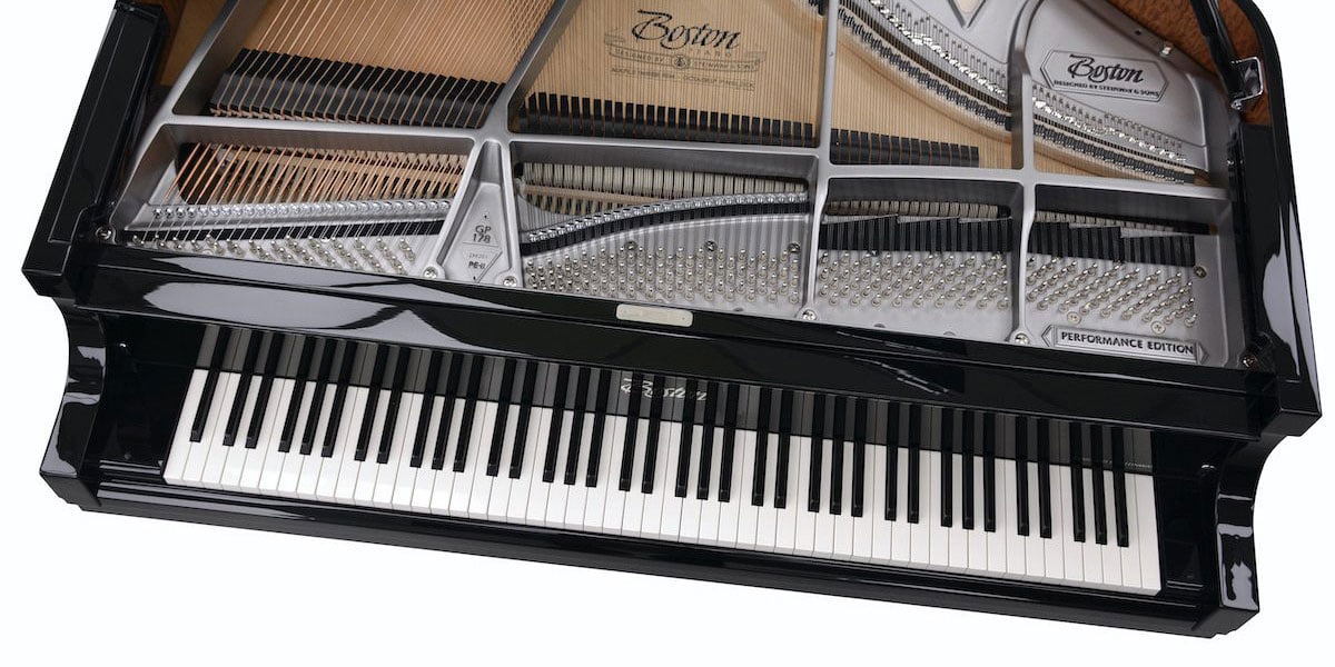 What is the difference between the Boston and Kawai pianos?