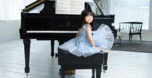 Young girl at Steinway Model S.