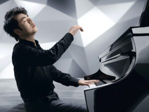 Concert pianist Lang Land playing a Steinway