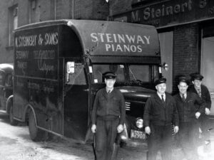 Vintage photo of M. Steinert delivery truck and workers