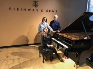 The Fitchburg State Steinway Selection team by their Steinway Model D