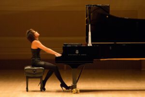 Yuja Wang performing on a Steinway Model D concert grand piano.